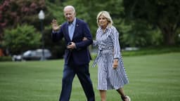 Biden escorted back from podium after dropout speech?