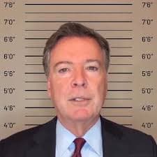 Will Comey smile in his mugshot?