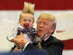 Trump photographed holding baby in August?