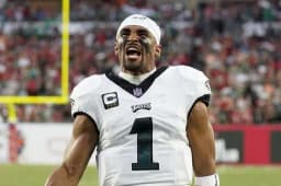 Will Player M lead the NFL in passing yards this season?