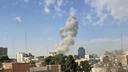Will another country conduct military action against Iran by April 15, 2026?