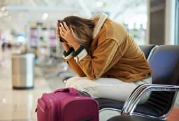 Will the number of US flights delayed on April 6 be between 6,500 and 7,000?