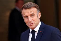 Will Donald Trump publicly insult Emmanuel Macron by May 31, 2026?