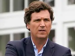 Will Tucker Carlson say "Trump" 10+ times at AmericaFest events on December 18?