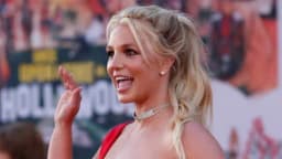Will Britney Spears' father be removed or resign from her conservatorship by October 1, 2021?